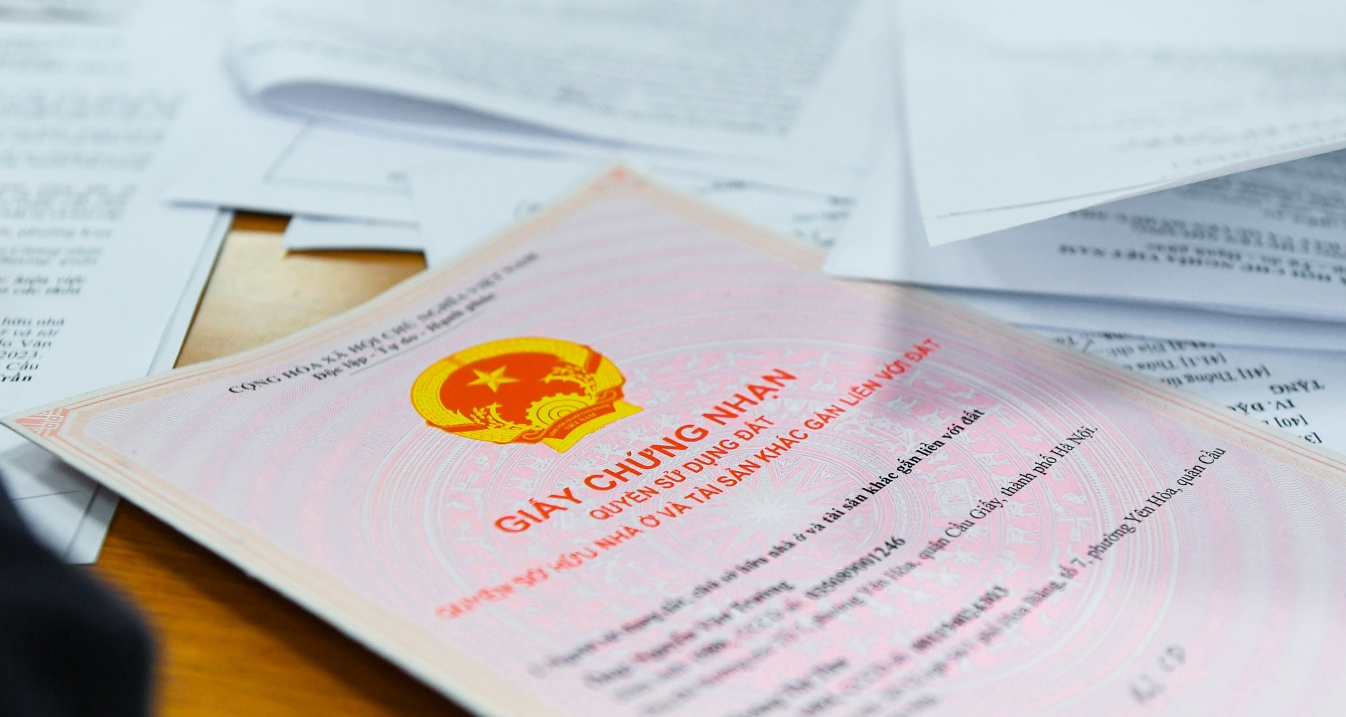 Chưa được cấp sổ đỏ, người dân có phải chịu tiền chậm nộp?