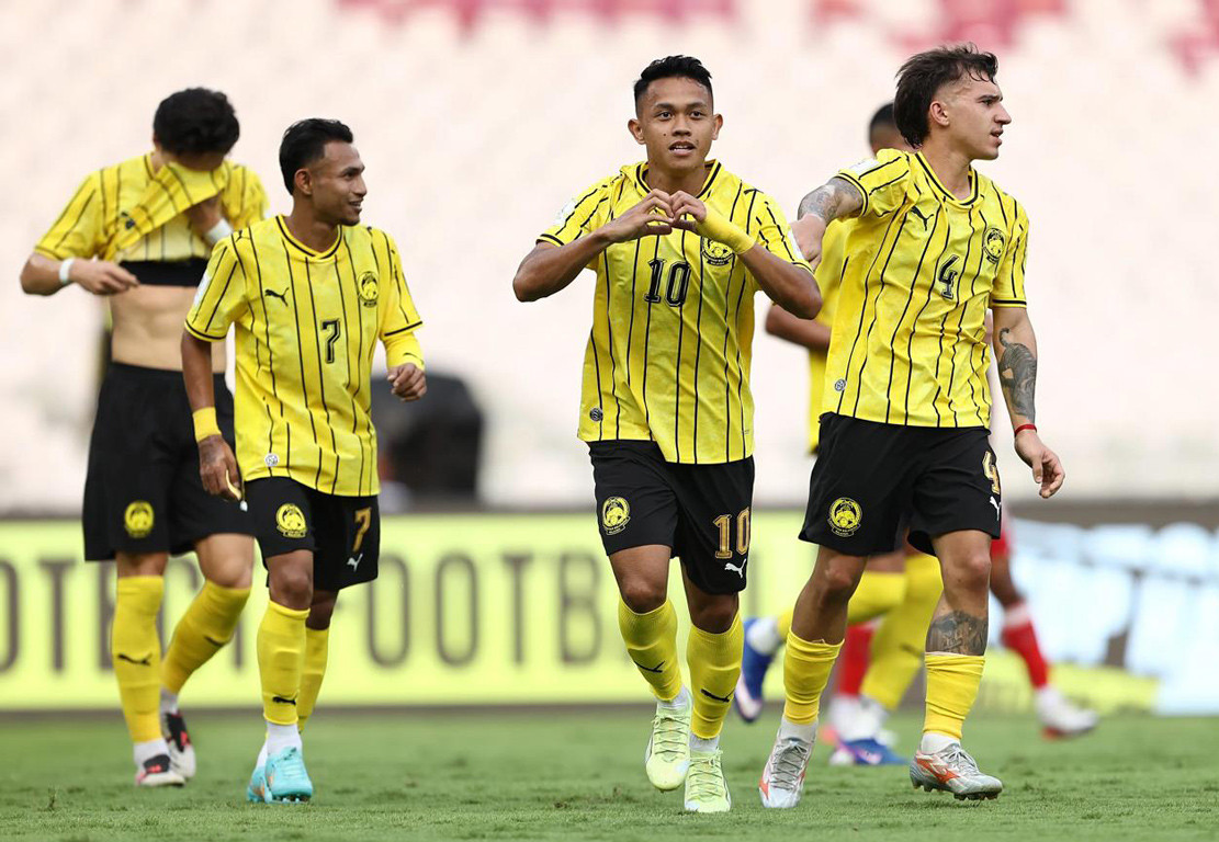 Arif Aiman celebrates a goal for Malaysia against Bangladesh at the FIFA ASEAN Cup.jpg