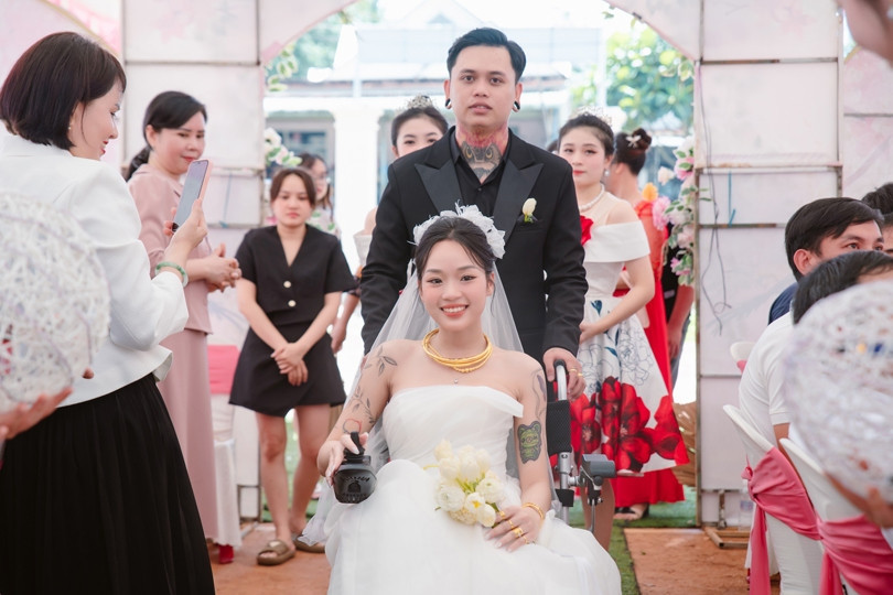 Young woman with paraplegia marries, gives birth, and starts a career