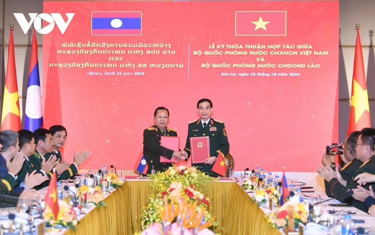 vietnam and laos sign bilateral defense cooperation document picture 1