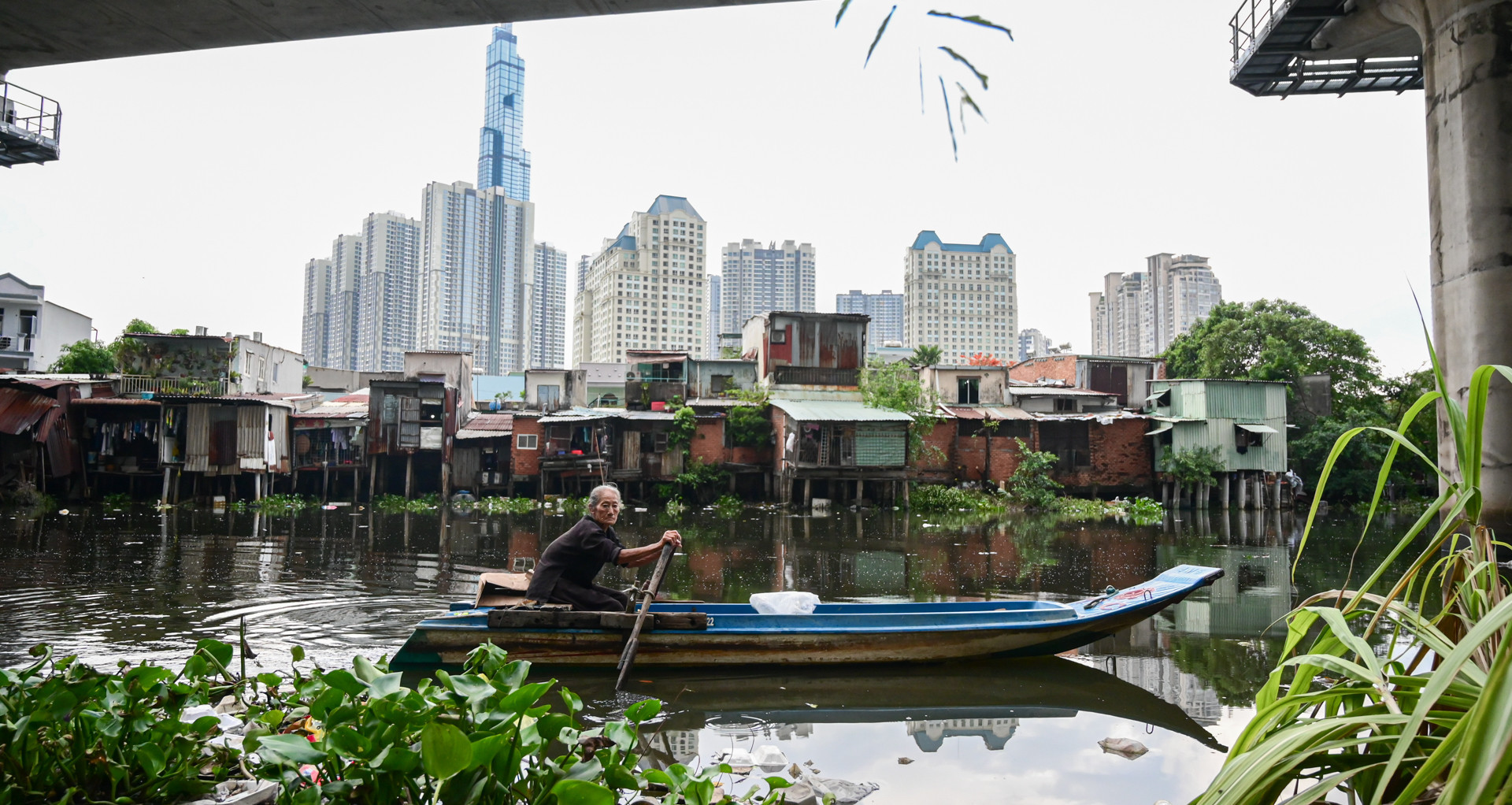 Living in the shadows: Slums beneath HCM City's skyscrapers