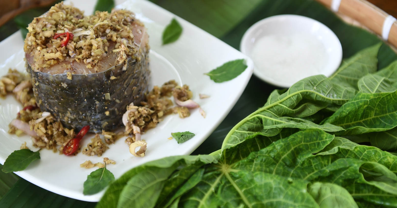 Mai Chau's signature dish: Da River carp with bitter papaya leaves