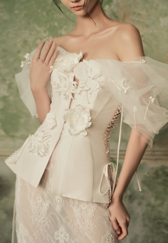 Unique wedding dress made from 2,000 origami flowers by Vietnamese designer