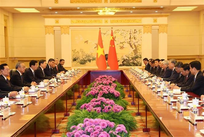 Party chief, President meets Chinese front leader