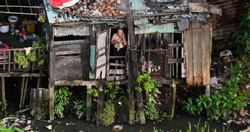 The dilemma of Ho Chi Minh City's riverside slums