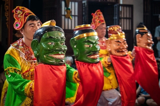 Photos depicting ancient wooden puppetry granted top photo award