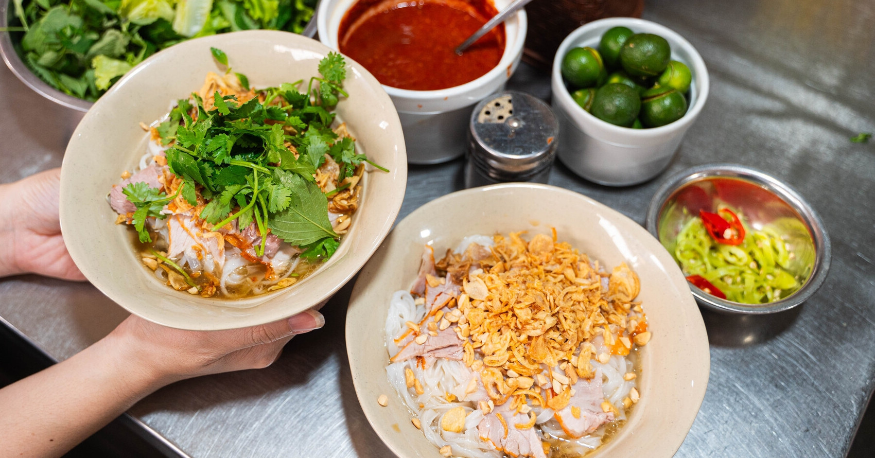 45-year-old pho tiu stall blends North and South in Hanoi alley