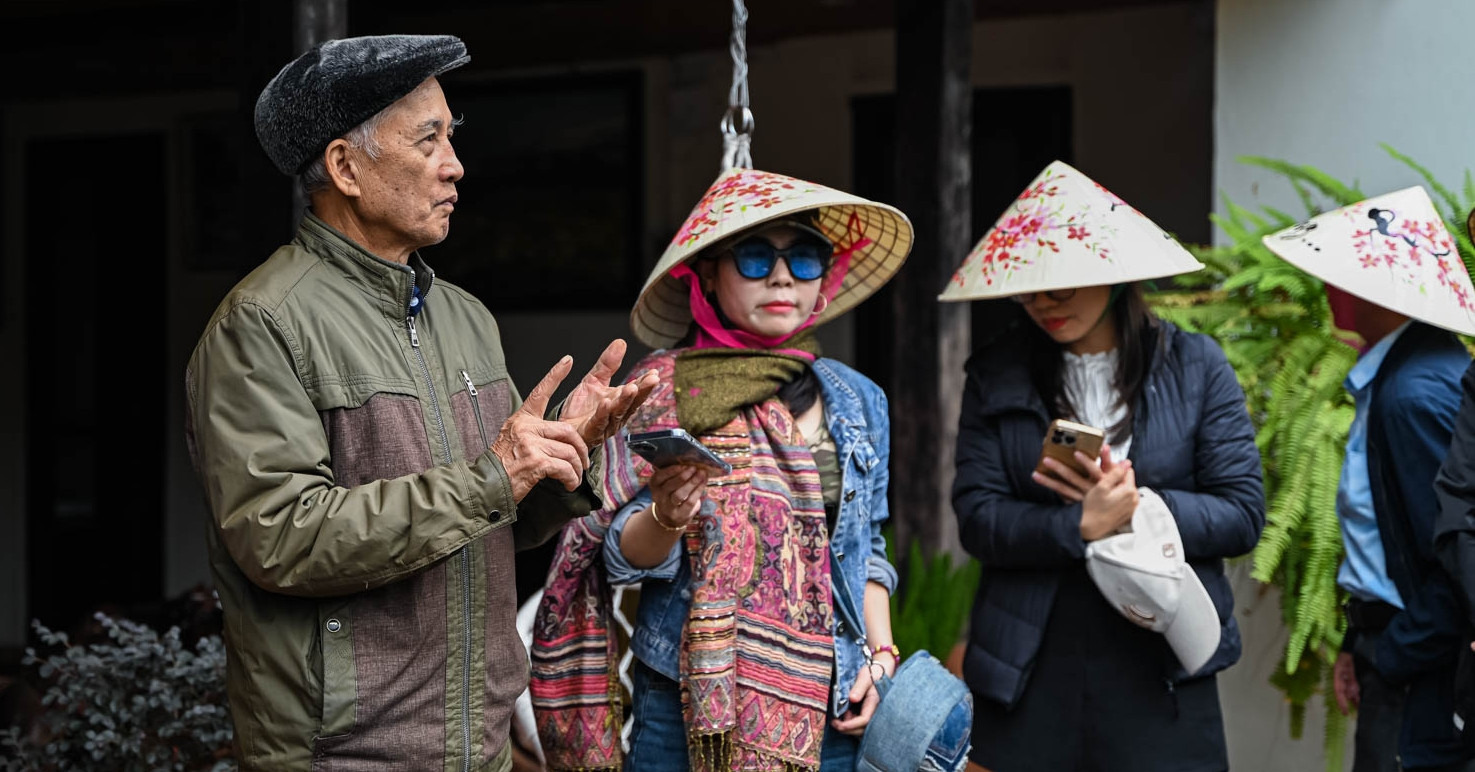Aging couple turns 100-year-old stilt house into homestay filled with love