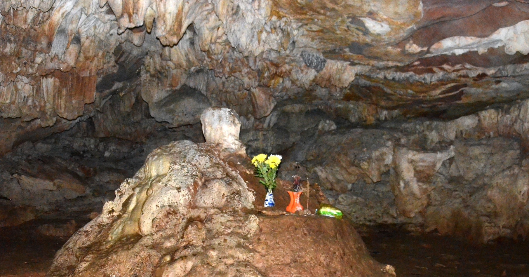 The sacred cave in Ninh Binh with a Buddha-shaped stalactite