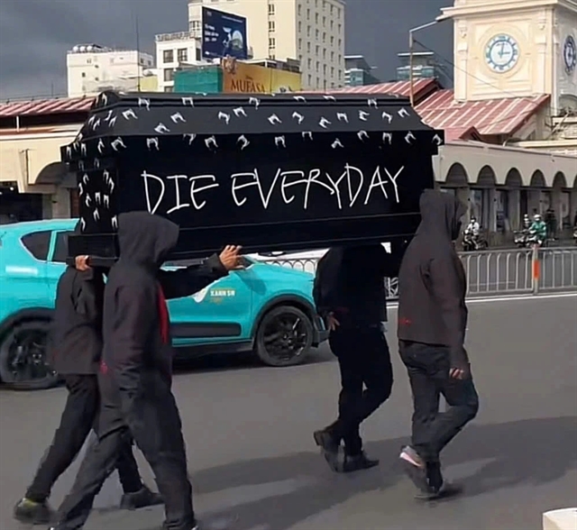 Nine people detained after 'coffin' publicity stunt near Ben Thanh market