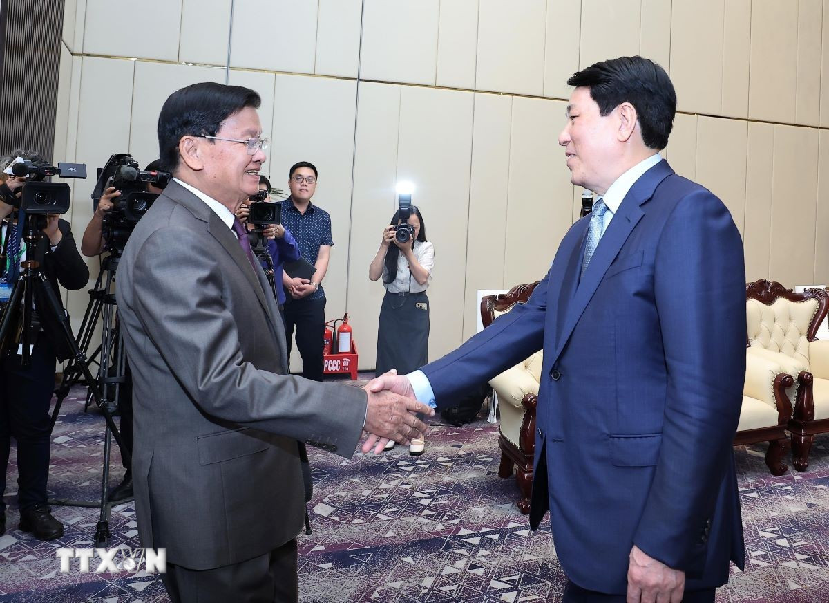 chu tich nuoc luong cuong hoi kien tong bi thu chu tich nuoc lao thongloun sisoulith 2.jpg