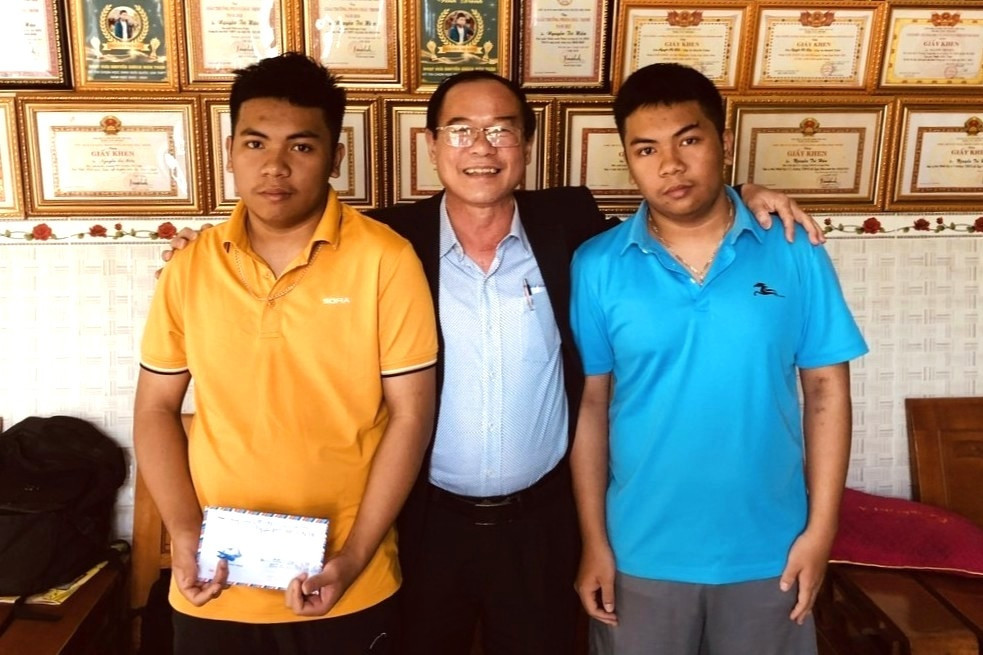 Twin brothers shine with gold at math Olympiad