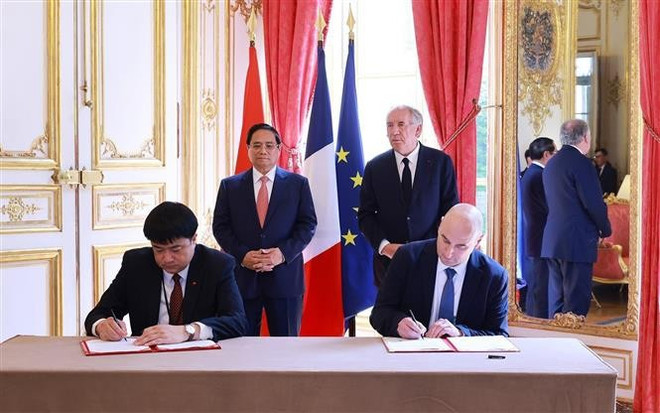 vna-potal-thu-tuong-pham-minh-chinh-hoi-dam-voi-thu-tuong-phap-francois-bayrou-8084265.jpg