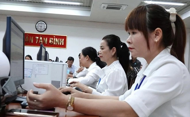 HCM City: New local administration model piloted in 102 wards, communes