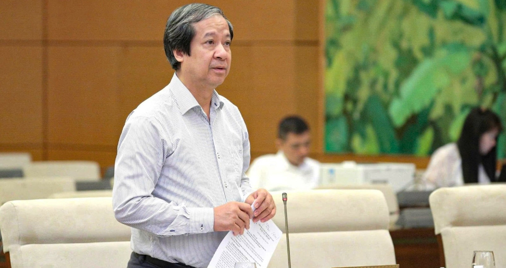 Minister defends ban on teachers tutoring own students after heated debate