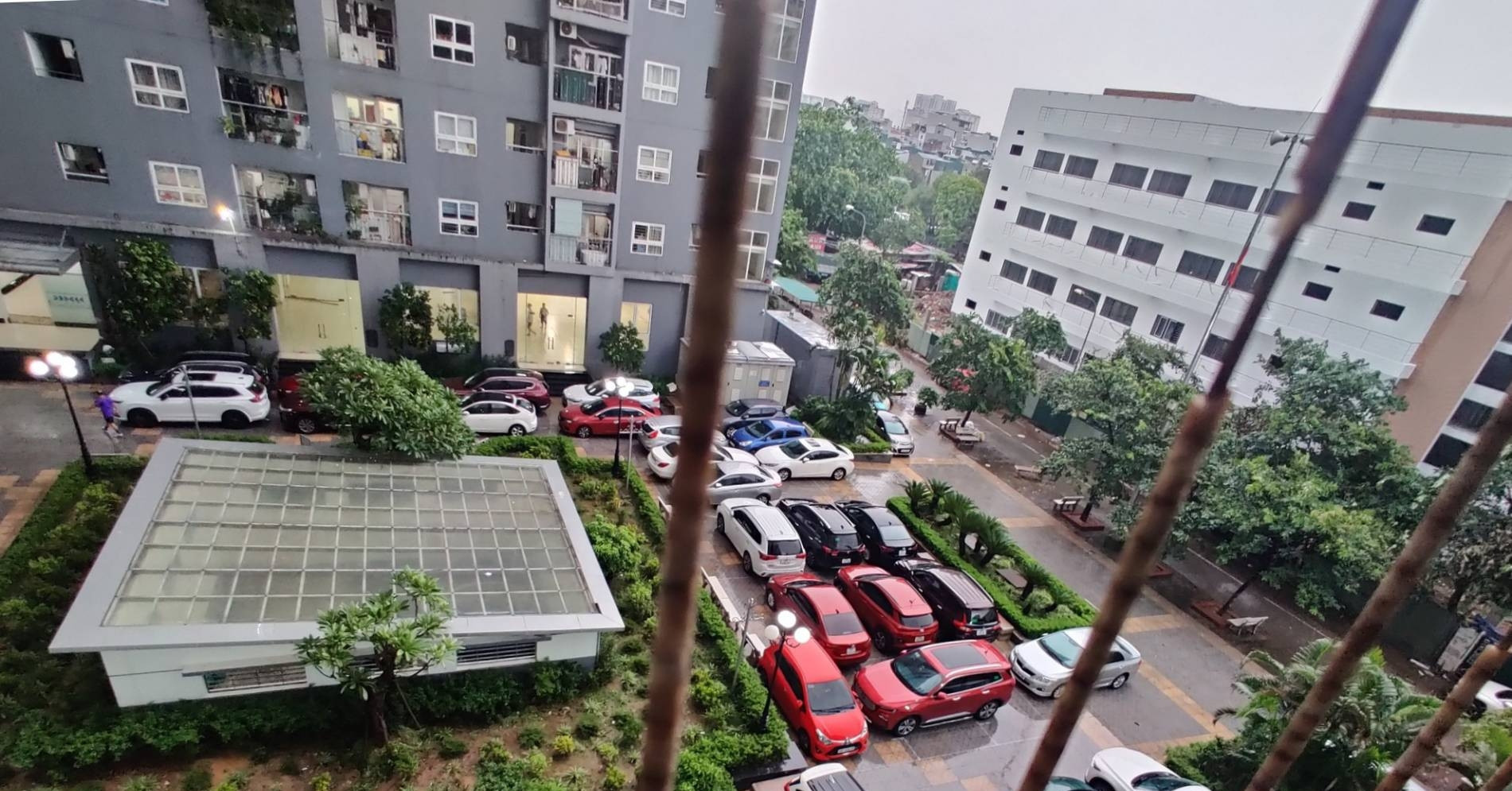 Hanoi car owners turn to courtyards and plazas for storm refuge