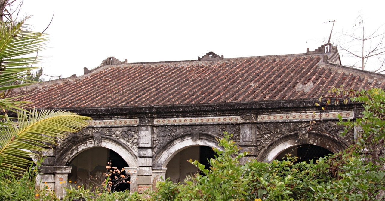 Ancient nail-free wooden house stands firm in modern Ho Chi Minh City