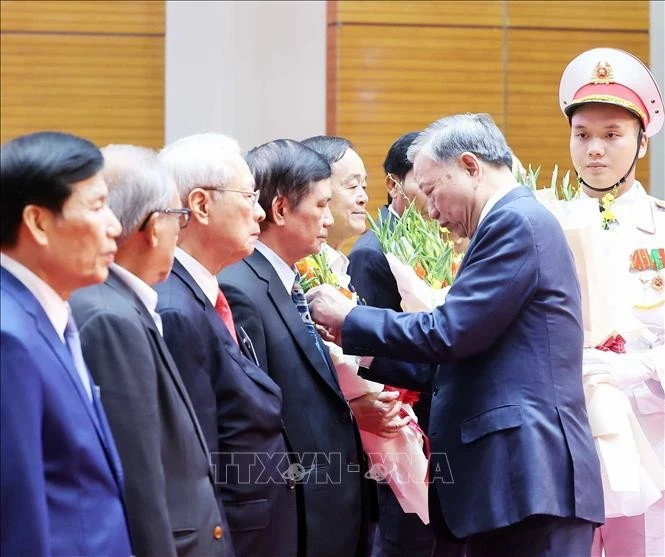 Party chief honors veteran revolutionaries' legacy