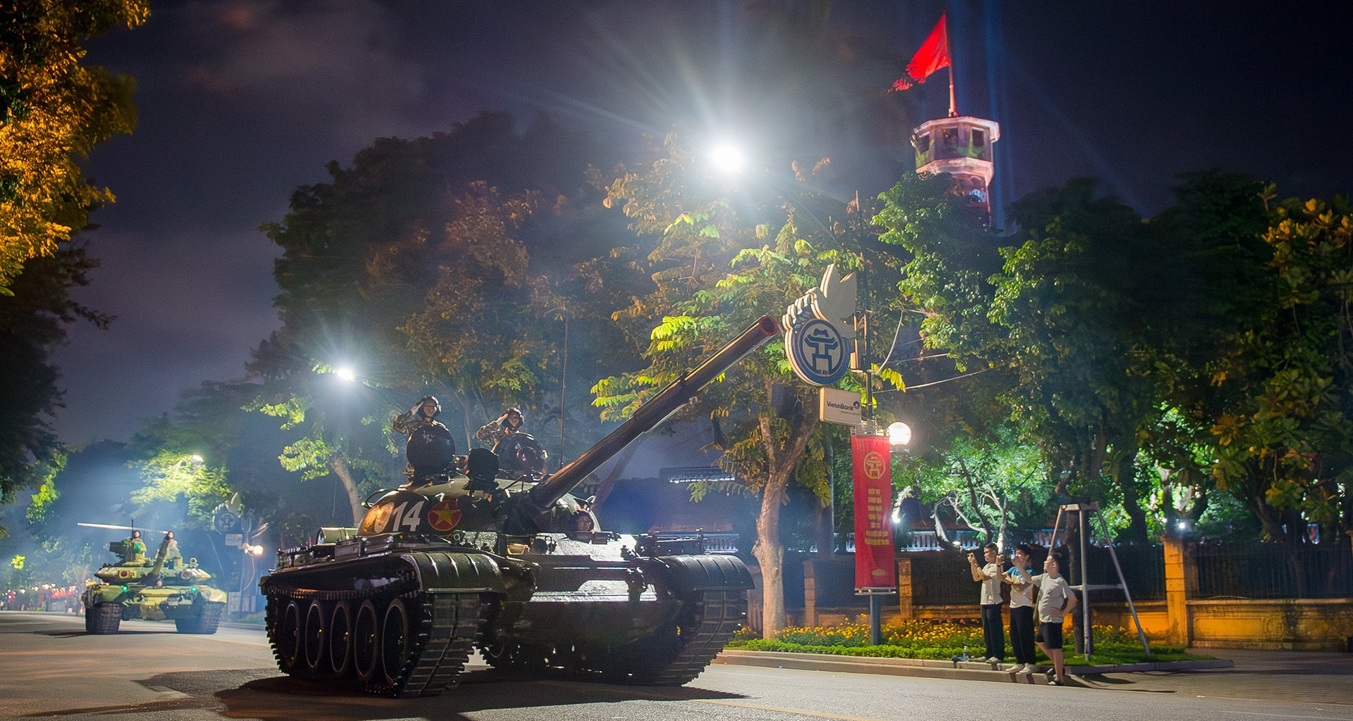 Tanks make history with first parade through Hanoi