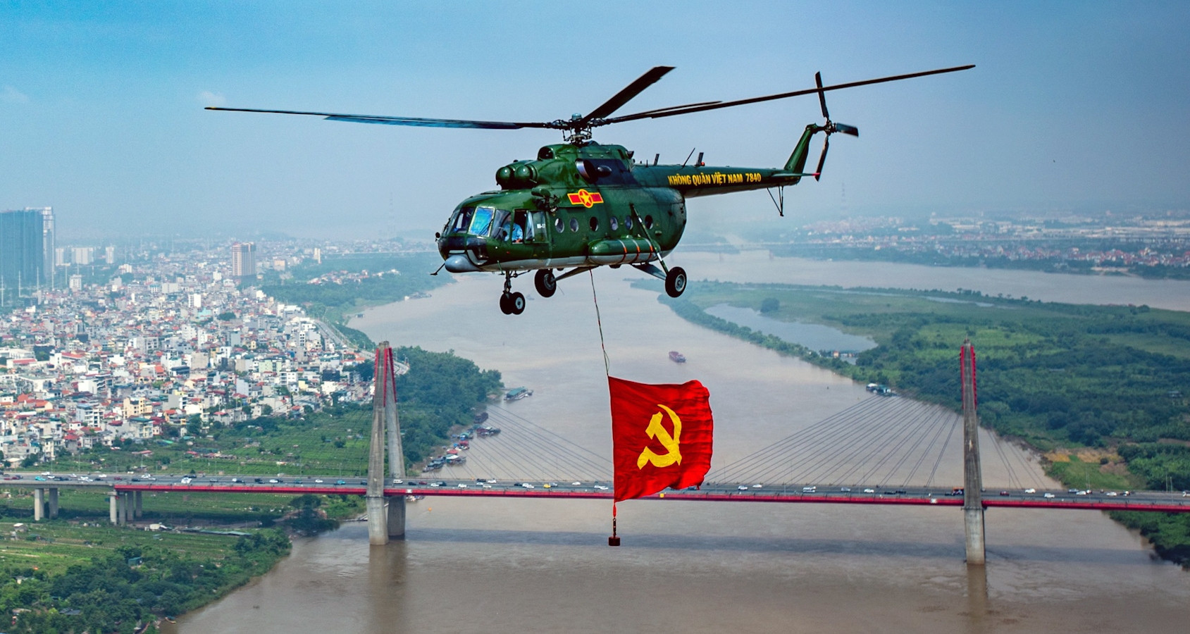 Hanoi’s timeless beauty and modern skyline shine under flying flags