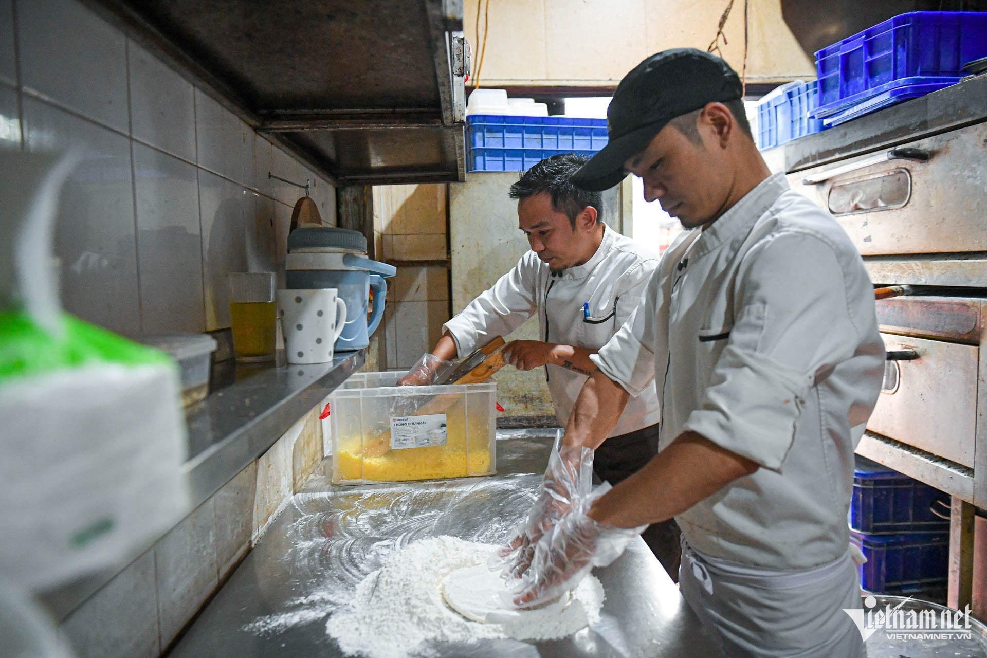 From shoeshiners to owners of a bustling pizza restaurant in Hanoi