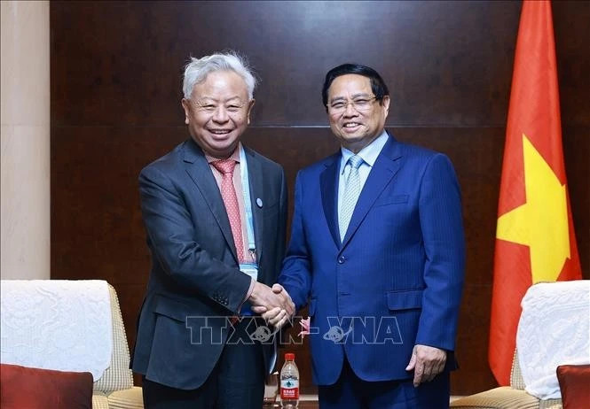 PM Pham Minh Chinh works with leaders of leading Chinese groups in Tianjin