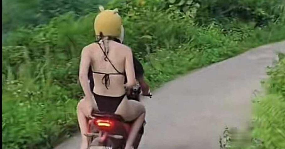 Tourist in bikini on motorbike sparks online debate in Tuyen Quang