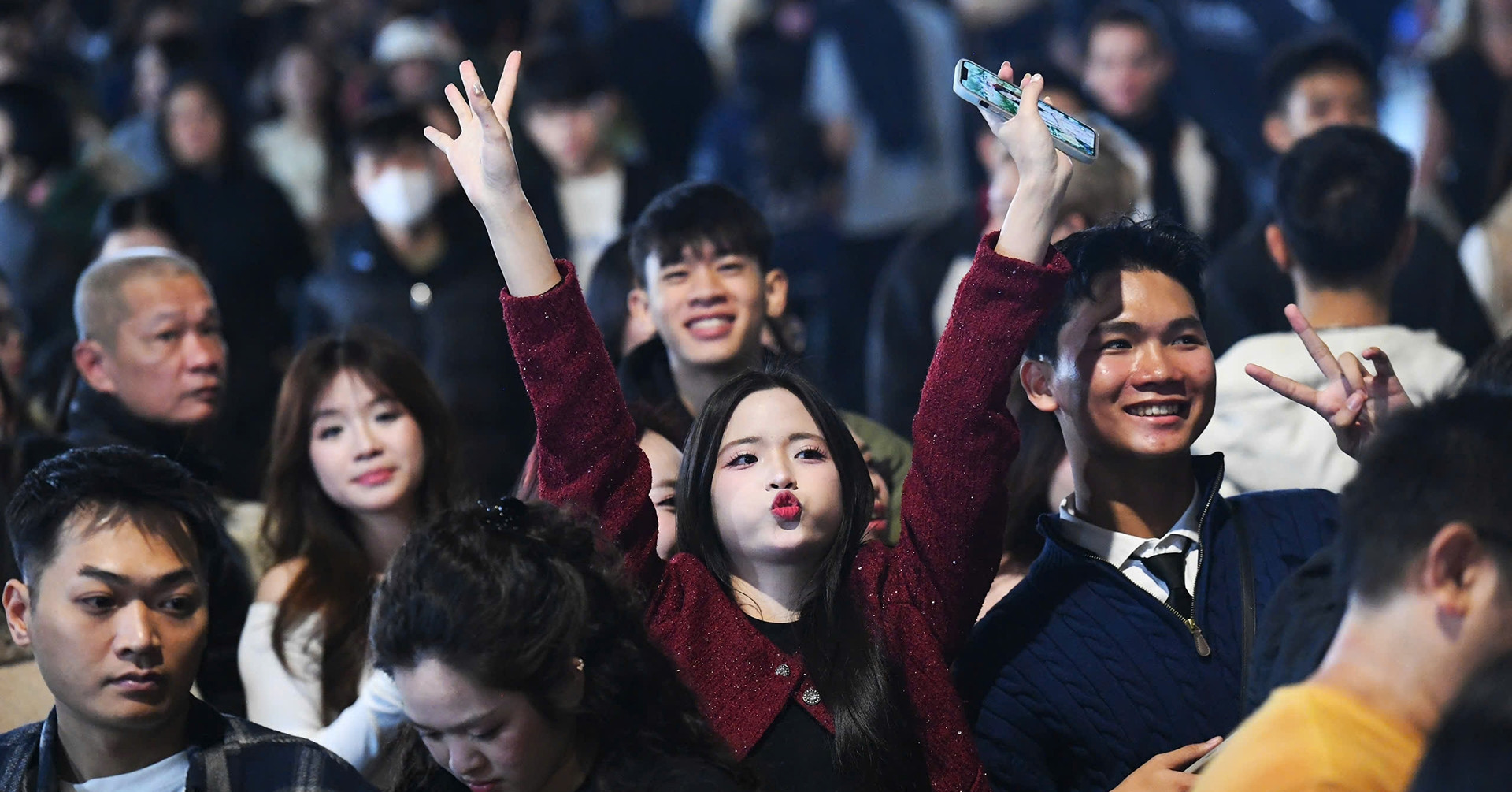 Festive crowds bring Hanoi and HCMC to a standstill on New Year’s Eve