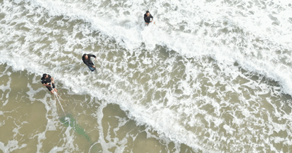 The unusual Tet job that pays millions: Walking backward to catch sea snails