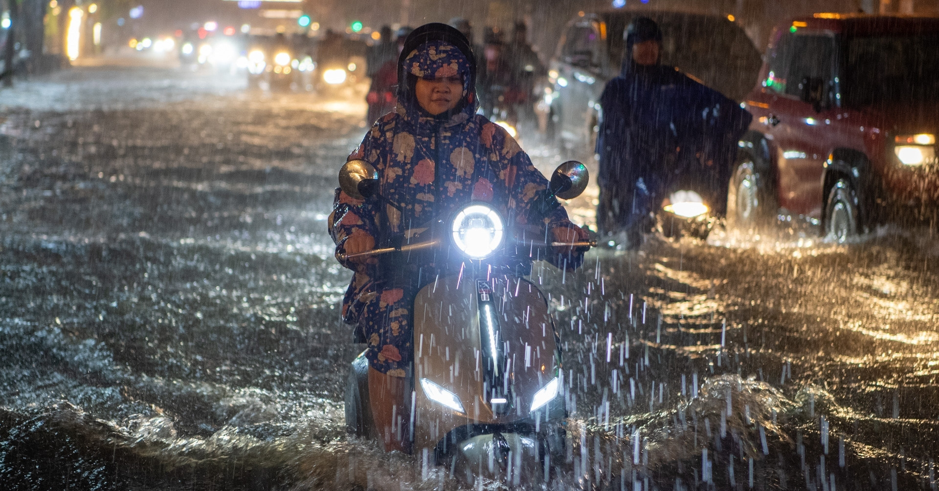 Southern Vietnam braces for more downpours as high tides threaten flooding