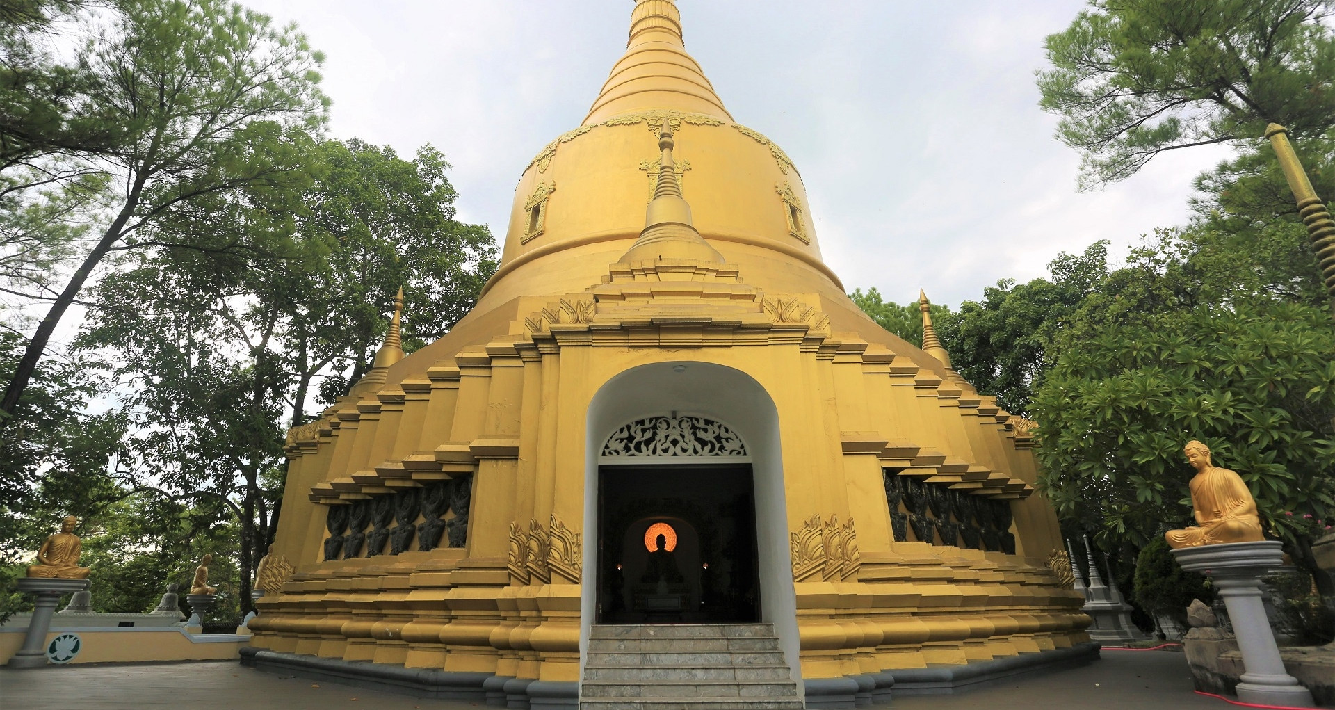 Golden stupa and giant Buddha statues set Hue's Thien Lam Pagoda apart