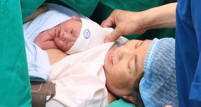 Woman gives birth safely at 60 in rare high-risk delivery