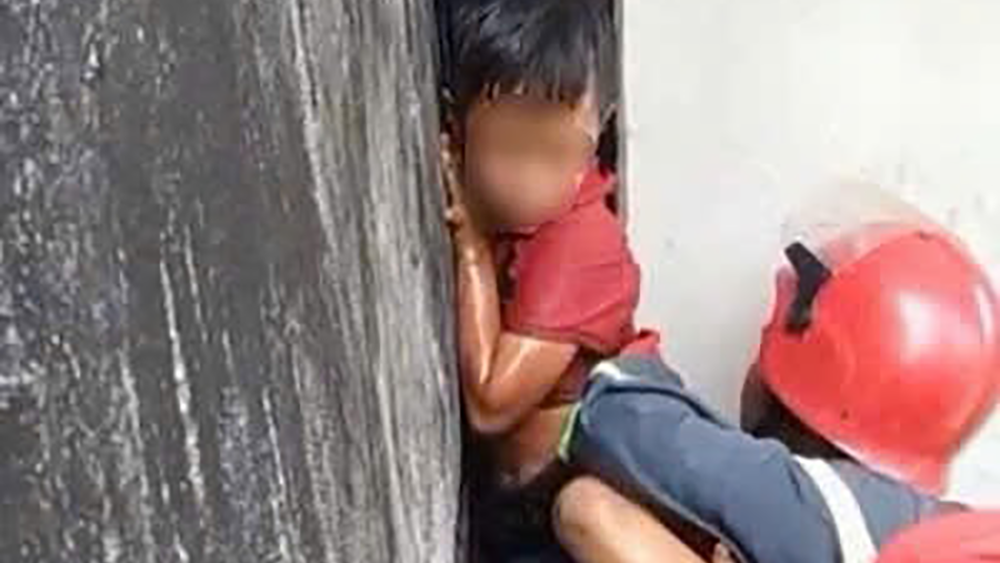 9-year-old boy rescued after getting trapped between walls in HCMC