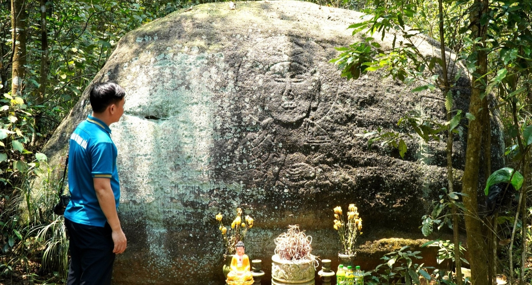 Ancient Buddha relief deep in mountain temple stirs curiosity