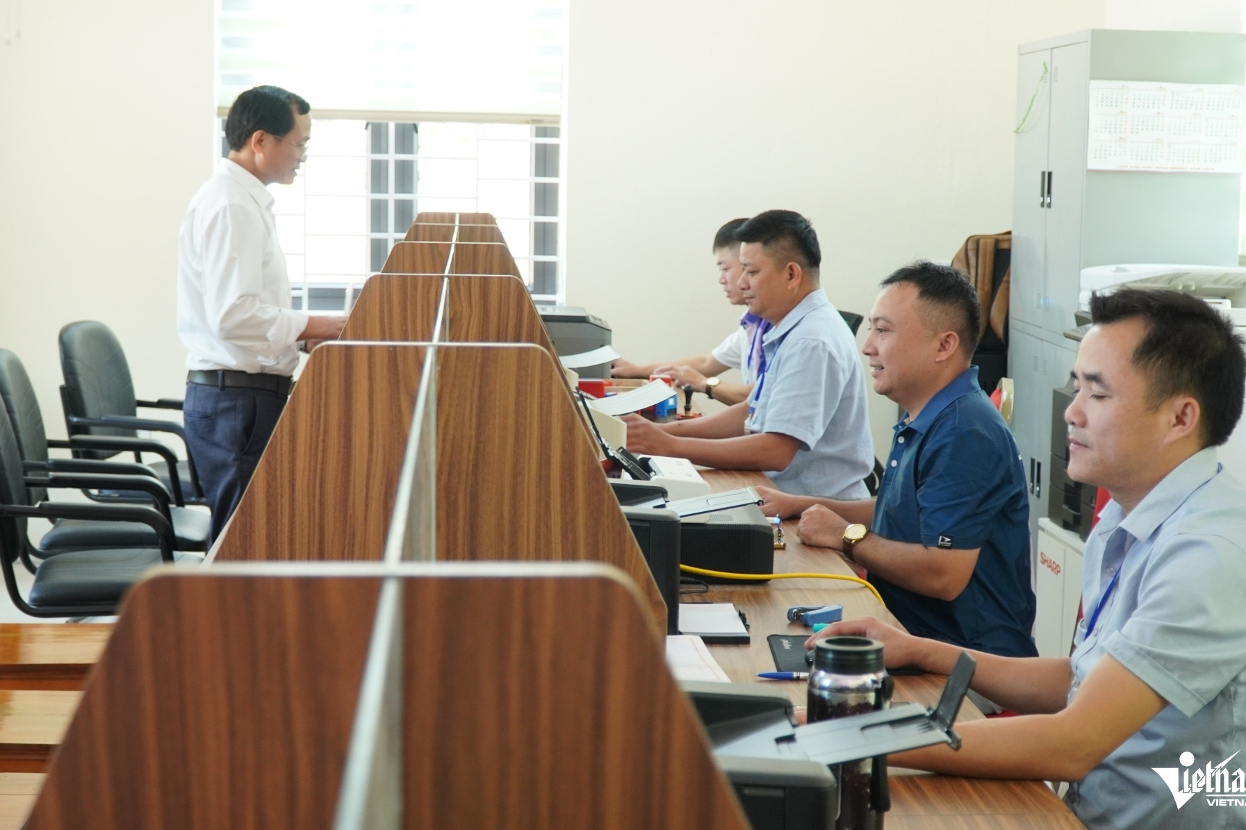 Two-tier government reform to gain momentum after transition period: expert