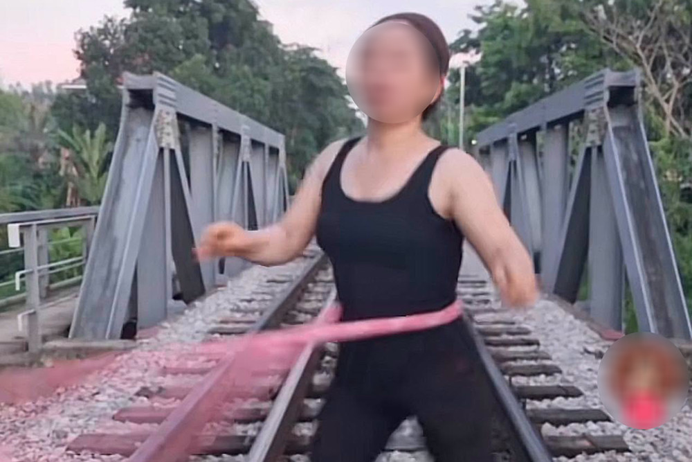 Woman fined after exercising on active railway tracks in Lang Son